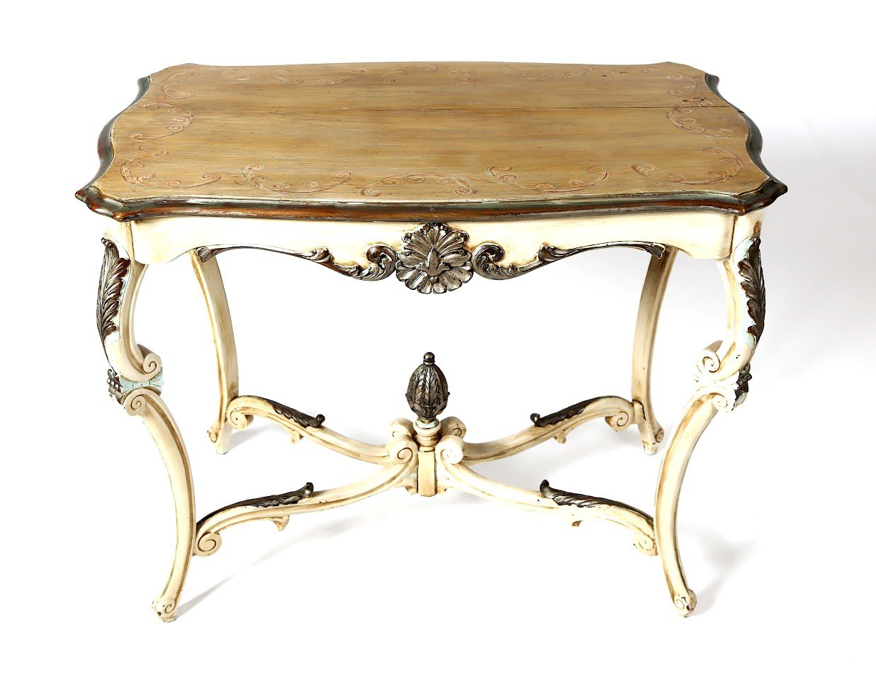 A table with a wooden top and white painted legs.