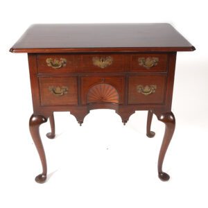 A small table with two drawers and a cabriole leg.