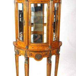 A very nice looking display cabinet with glass doors.