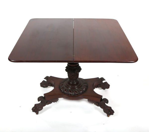 A square table with four legs and two leaves.