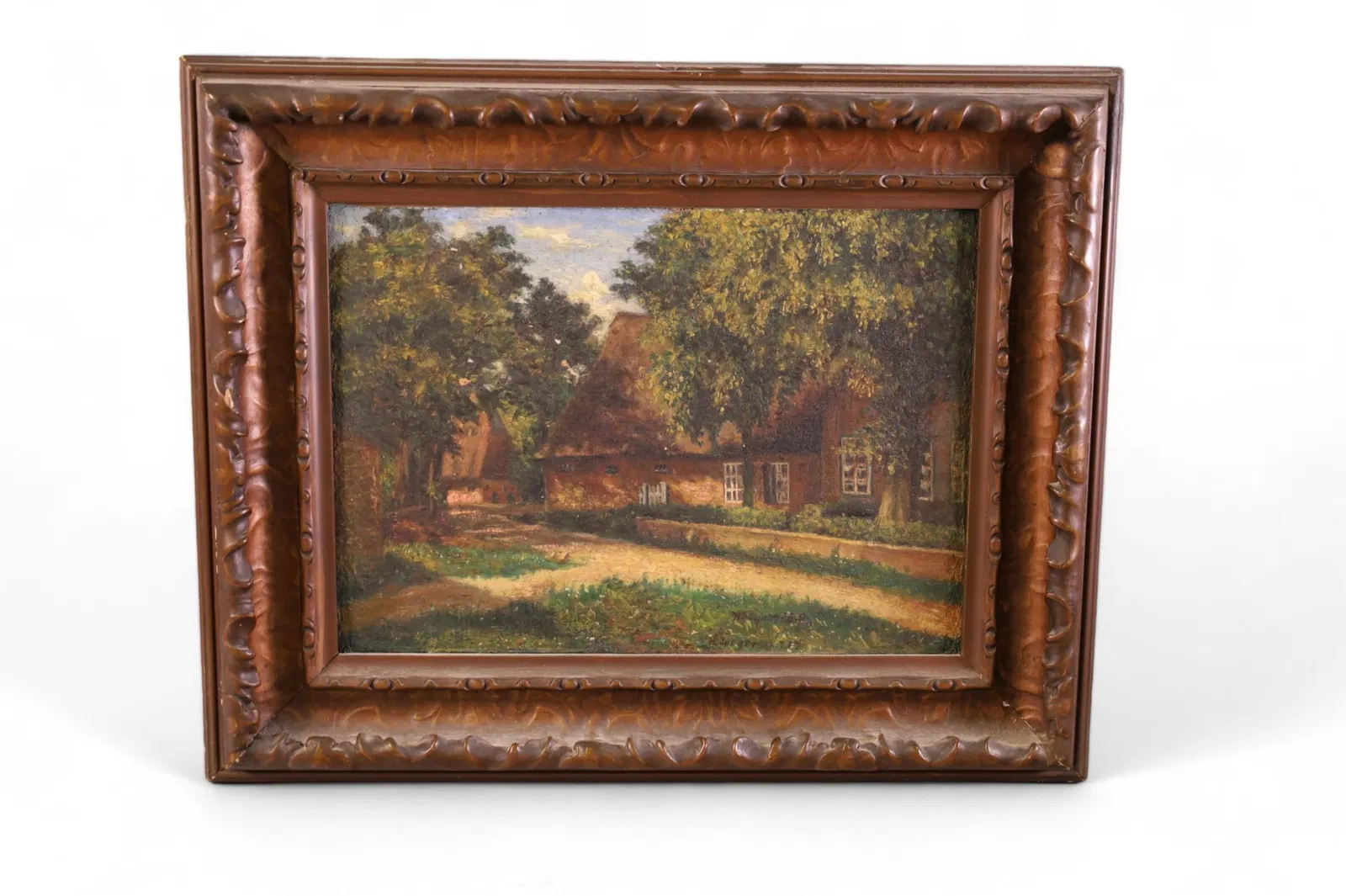 Framed oil painting of a country house.