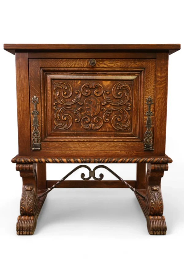 Antique wooden cabinet with ornate carvings.