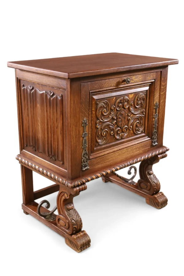 Ornate wooden cabinet with carved details.