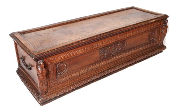 Ornate wooden chest with carvings.