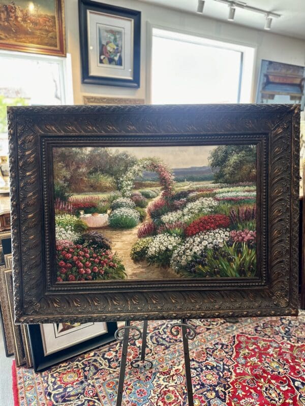 Oil on canvas in carved regency frame, depicting floral footpath