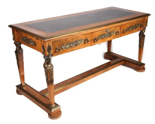 Antique writing desk with ornate details.