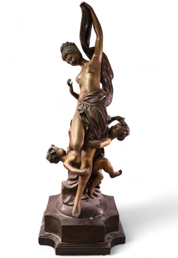 French Bronze with Lady entwined with cherubs on black marble base