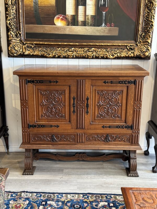 Antique Spanish 2 door carved oak cabinet