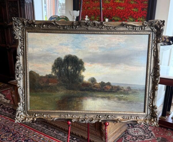 Antique Landscape oil on canvas depicting lake scene, original frame