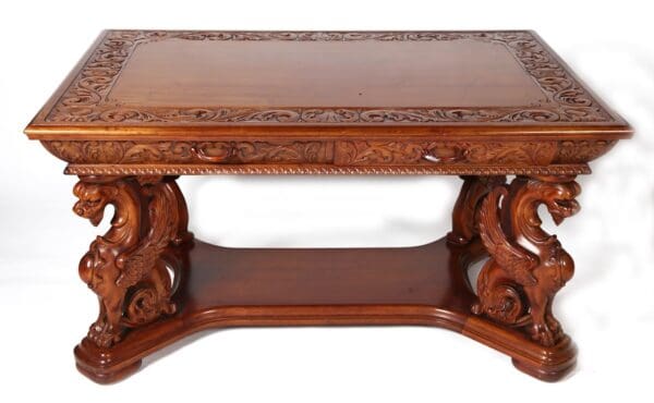 Antique English carved wing griffin desk with 2 draws