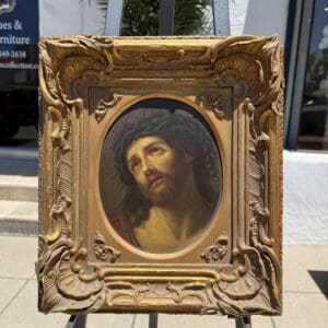 Framed painting of Jesus wearing crown of thorns