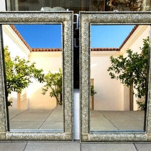 Pair of 54 inch mother of pearl mirror and bone inlaid rectangular wall mirrors with geometric floral mosaic frames at The Chapman Collection